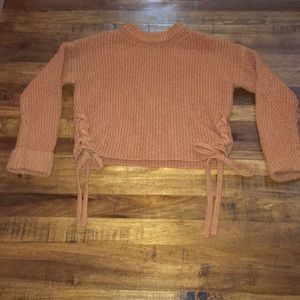 Burnt orange lace up side sweater